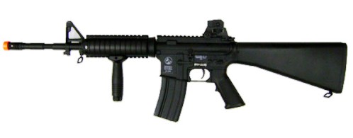 Photo picture of an airsoft m4 rifle by Colt. All black in color, with an orange shooting tip.