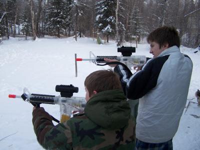 Two of my boys shooting off a few rounds from the deck