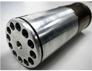 Picture of airsoft grenade, silver with 12 holes around the outside and one hold in the middle. All silver.