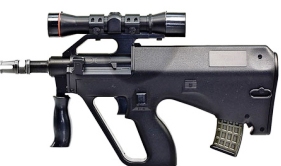 photo of black mini airsoft electric gun